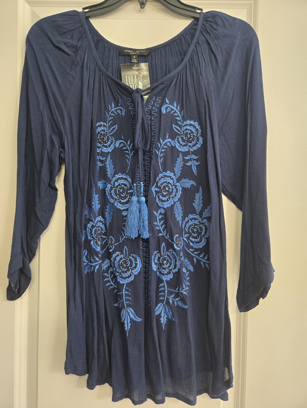 Romeo Juliet Navy Tunic with Bright Blue Floral Embroidery and Tassel Tie.